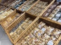 Variety of nuts and seeds in woven baskets at market display Royalty Free Stock Photo
