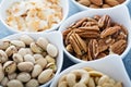 Variety of nuts in small bowls Royalty Free Stock Photo