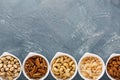 Variety of nuts in small bowls Royalty Free Stock Photo