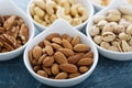 Variety of nuts in small bowls Royalty Free Stock Photo