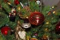 A variety of old fashioned ornaments and pine cones on a Christmas Tree Royalty Free Stock Photo