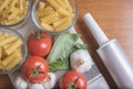 Variety of pasta with tomatoes, basil, mushrooms and garlic Royalty Free Stock Photo