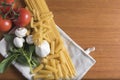 Variety of pasta with tomatoes, basil, mushrooms and garlic Royalty Free Stock Photo