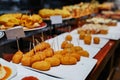 Variety of pinchos pintxos in a bar of San Sebastian, Spain Royalty Free Stock Photo