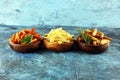 Variety of potatoes with fries. potato wedges, french fries, sweet potato for lunch on table Royalty Free Stock Photo