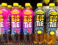 Variety of rauch eistee fruit flavored iced tea bottles on grocery shelf Royalty Free Stock Photo