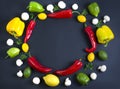 Variety of raw vegetables, culinary concept. Assortment of vegetables and herbs on grey stone background. Top view. Copy space. Di Royalty Free Stock Photo