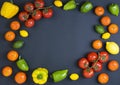 Variety of raw vegetables, culinary concept. Assortment of vegetables and herbs on grey stone background. Top view. Copy space. Di Royalty Free Stock Photo