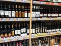 Variety of red wines in local supermarket. Royalty Free Stock Photo