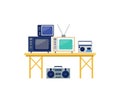 Variety of retro electronics on table. Vintage TVs, radios, and boombox collection. Nostalgia and technology evolution