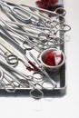 Variety of scissors and medical equipment on tray Royalty Free Stock Photo