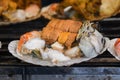 Variety of seafood grilled on scallop shell Royalty Free Stock Photo