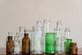 Variety shape and color of empty glass container bottles, reuse things concept
