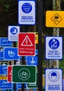 Variety of sign labels near the street in big city for warning drive drive carefully in Songkran festival in Thailand.