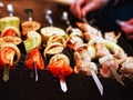 A variety of skewered meats and vegetables