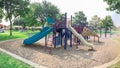 Variety of slide and swing at Colorful playground near residential neighborhood in Richardson, Texas, USA