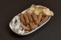 Variety snacks plate on wooden table