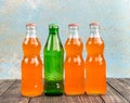 Variety of soda bottle on the wooden background Royalty Free Stock Photo