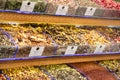 A variety of spices and savories on the counter at the store. Variety of aromatic spices in stores Royalty Free Stock Photo