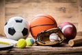 Variety Of Sport Accessories On Wooden Surface