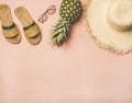 Variety of summer apparel items and fresh pinapple, copy space Royalty Free Stock Photo