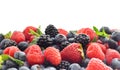 Variety of summer berries closed up in a border Royalty Free Stock Photo