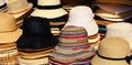 A variety of summer women`s hats in a street market Royalty Free Stock Photo