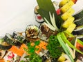 Variety of sushi rolls on a white plate Royalty Free Stock Photo