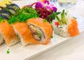 Variety of sushi rolls on a white plate Royalty Free Stock Photo