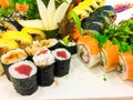 Variety of sushi rolls on a white plate Royalty Free Stock Photo