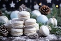 Variety of sweet macaroons. The branches of spruce on bokeh background. Modern european French cuisine. Christmas theme