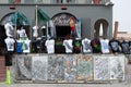 Variety of t-shirts in different colors and designs displayed on a street stall in Venice Beach