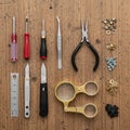 Plier a stainless steel ruler and two small craft knives are Royalty Free Stock Photo