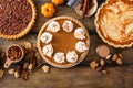 Variety of traditional Thanksgiving pies on light background