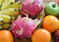 Variety tropical fruits on wooden table