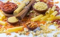 Variety of types and shapes of dry italian pasta. background Royalty Free Stock Photo