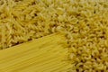 Variety of types and shapes of raw italian pasta. Close-up Royalty Free Stock Photo