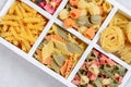 Variety of types and shapes of raw Italian pasta. Royalty Free Stock Photo