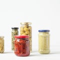 Variety of typical Italian food preserved in glass jars.