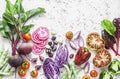 Variety of vegetables a light background. Beets, red cabbage, beans, tomatoes, red onions, peppers food background.