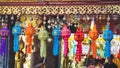 Variety of vibrant, ornamental decorations in an open-air market