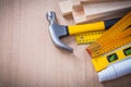 Variety of working building tools on wood board