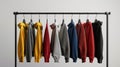 a variety of youth cashmere sweaters, hoodies, and sweatshirts arranged neatly on a clothes rack, suitable for mock-up