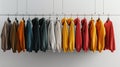 a variety of youth cashmere sweaters, hoodies, and sweatshirts arranged neatly on a clothes rack, suitable for mock-up