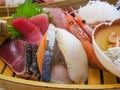 Variou kind of sashimis on a boat shaped tableware Royalty Free Stock Photo