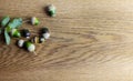 Various acorns on a cedr plank as a background decoration for the holiday