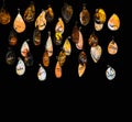 Various amber medallions on a black background