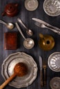Various antique vintage dishes on black background