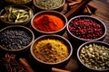 Various aromatic spices being carefully measured out in small bowls for cooking preparation