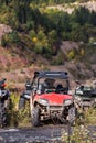 Various ATV quad motors in the forest area ready for adventurous driving